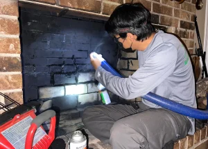 technician repairing a chimney to restore safety and functionality