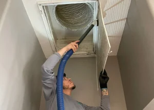 Air duct cleaning technician at work in Houston