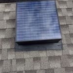 Completed solar attic fan installation on roof