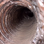 cleaning air ducts during mold remediation project in Baytown TX